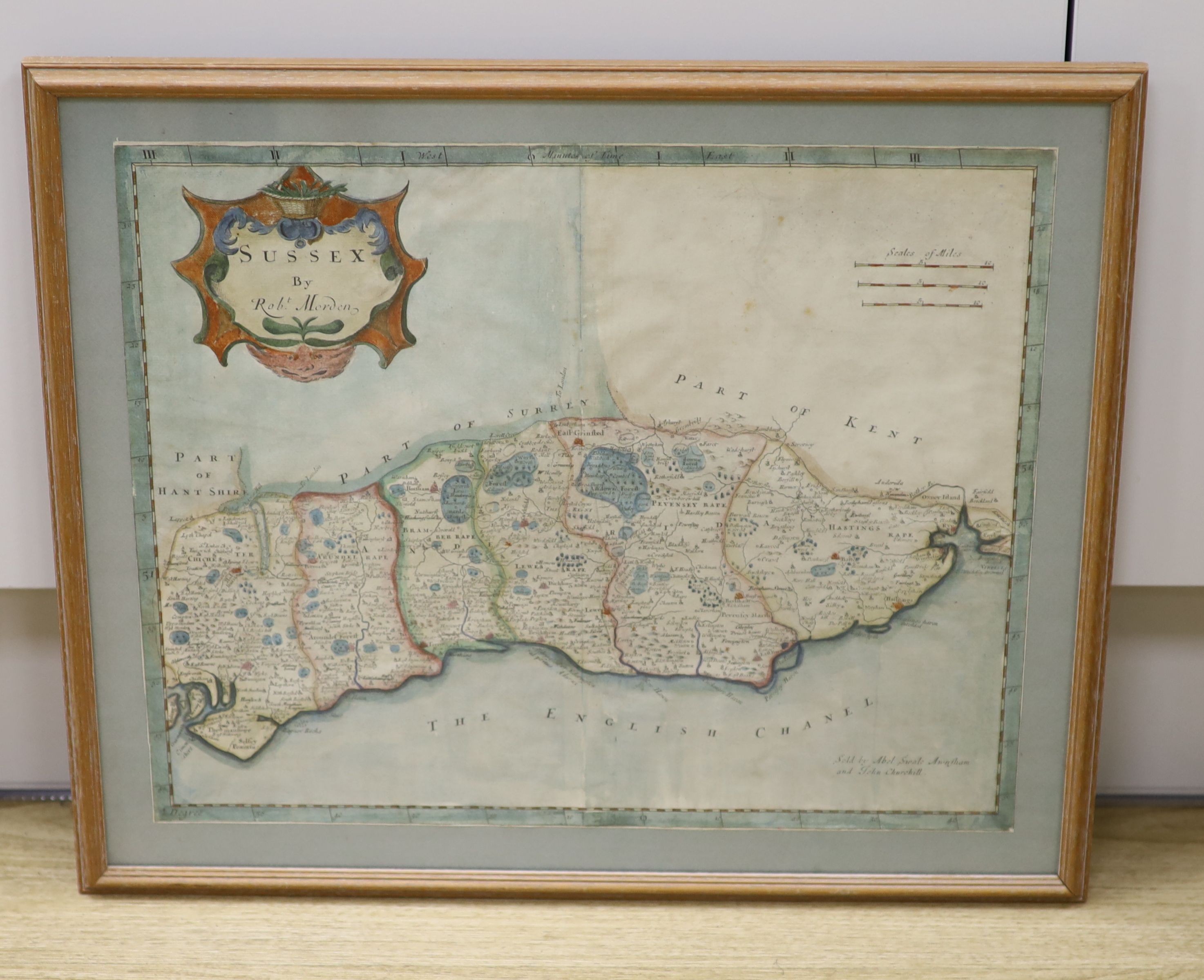 Robert Morden - a coloured engraved map of Sussex, 34 x 41cm.